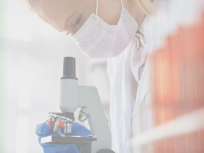 Microscope laboratory - woman medical research chemist experiment